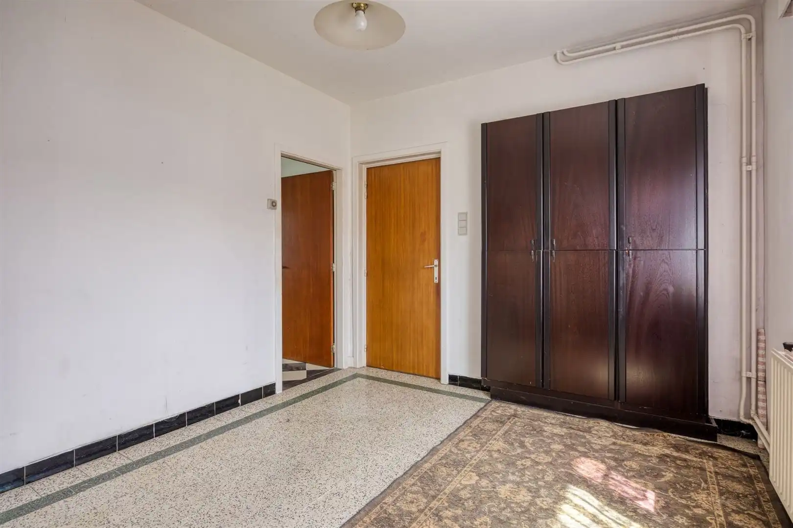 TE KOOP: Te renoveren woning met ruim perceel en projectmogelijkheden in Lummen! foto 9
