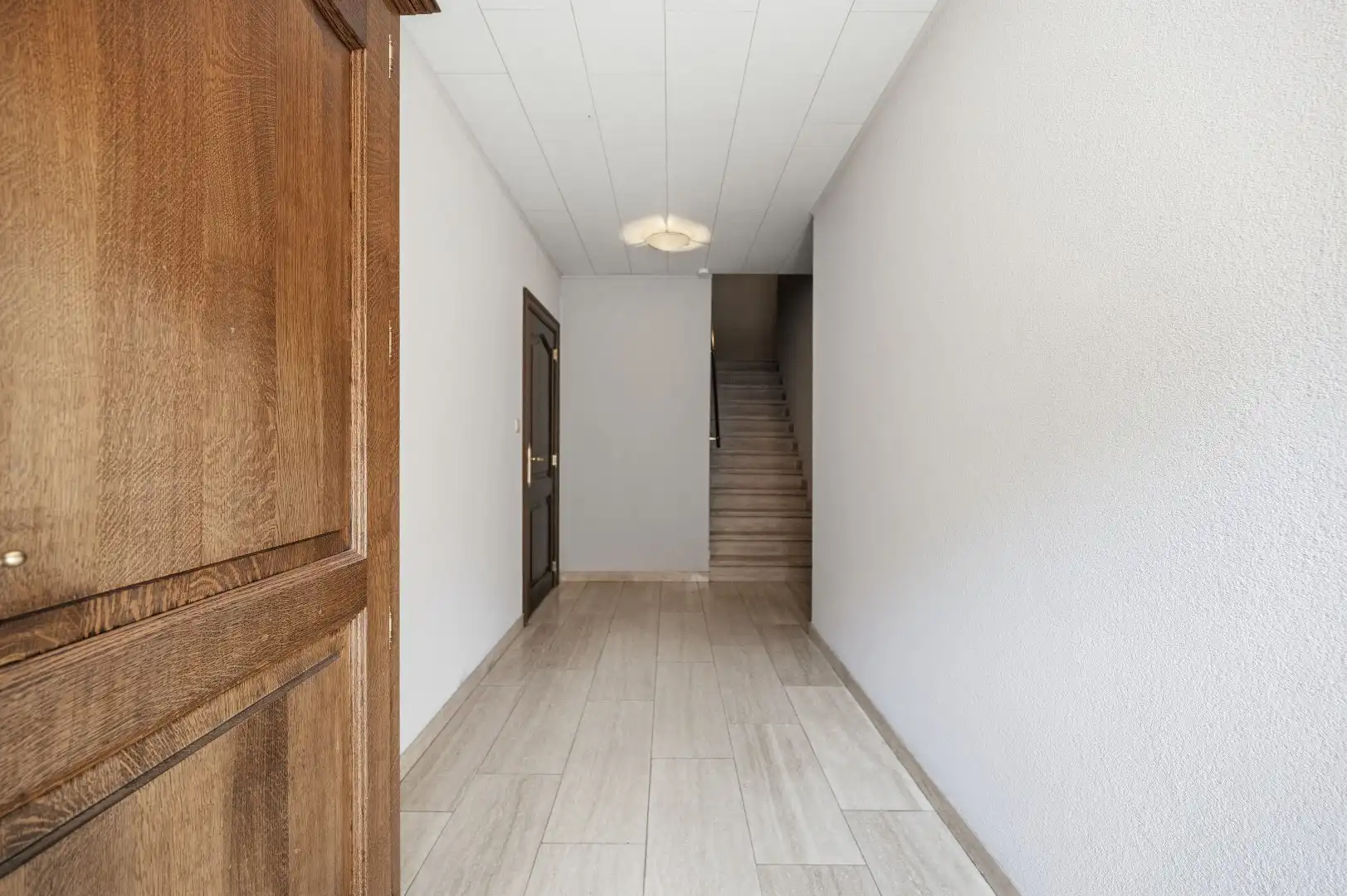 1 rijwoning en 2 appartementen in gezellig Hoegaarden foto 22