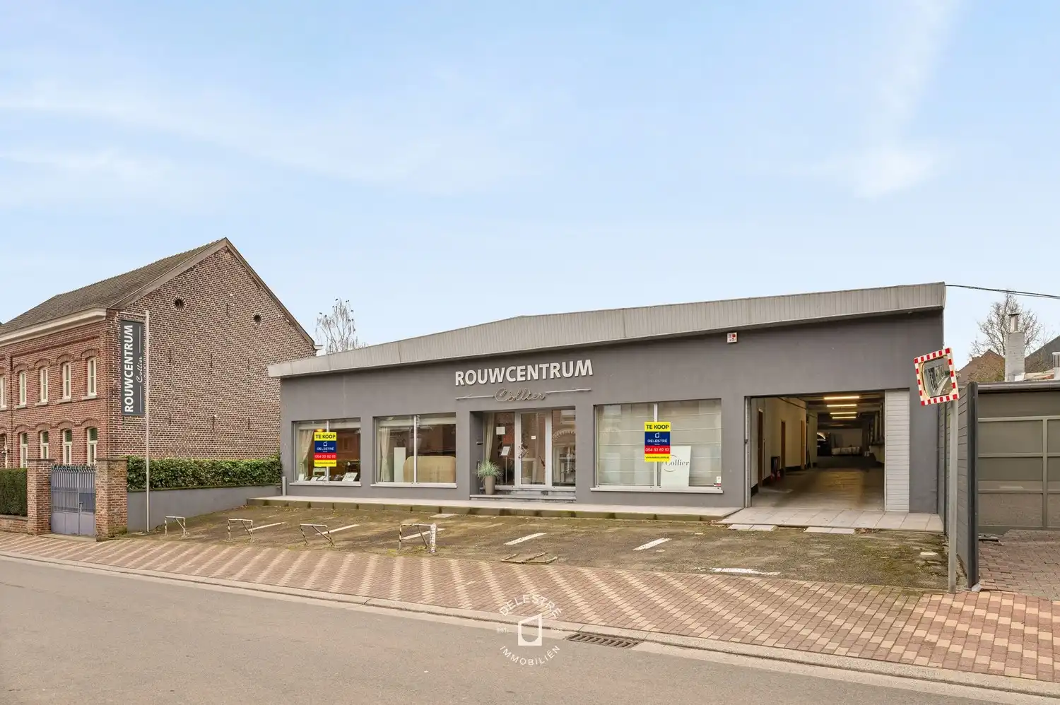 Multifunctioneel gebouw te koop op commerciële topligging te Onkerzele foto {{pictureIndex}}