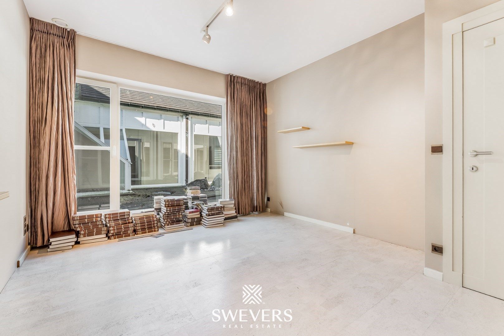 Handelspand met ruime woning in hartje Lummen – een unieke opportuniteit foto 22