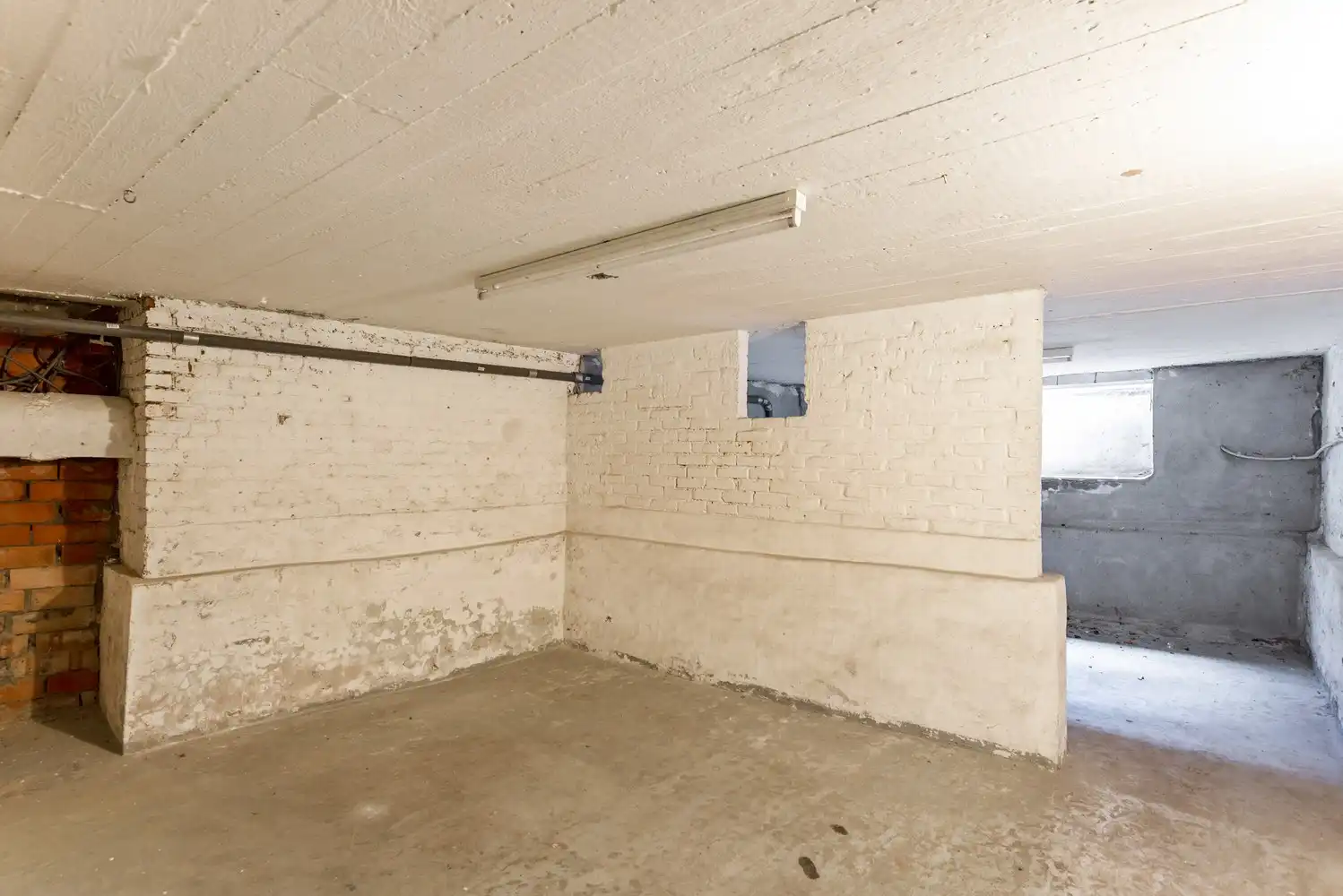 Handelshuis met 2 handelsruimtes en appartement in het hart van Wommelgem. foto 16