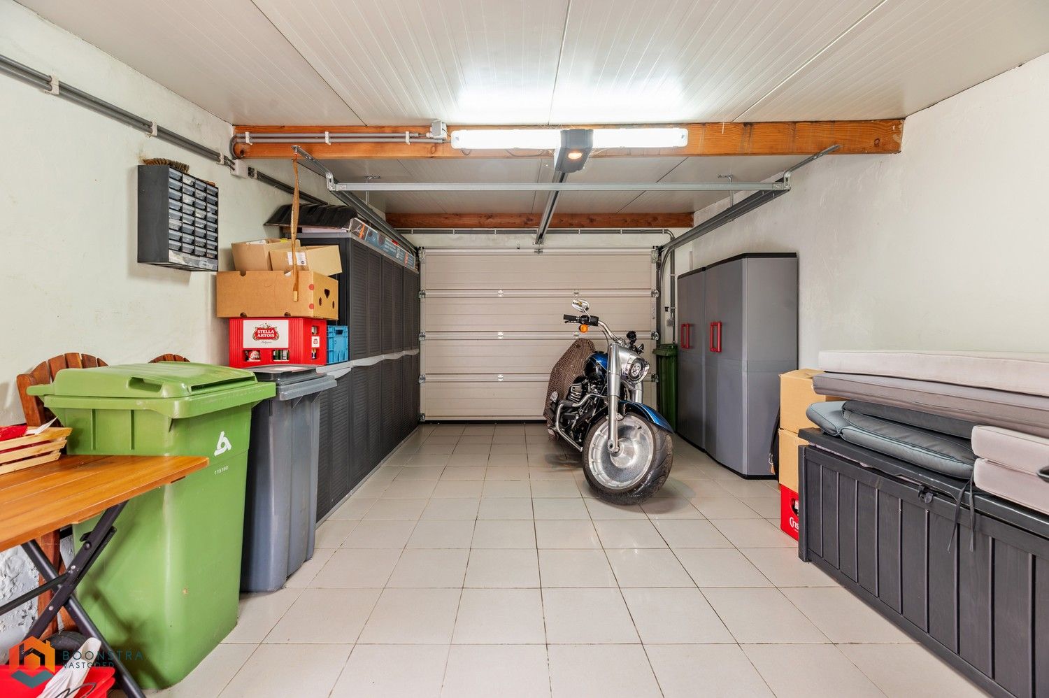 Verzorgde woning met 2 slpkrs, leuke tuin en garage foto 25