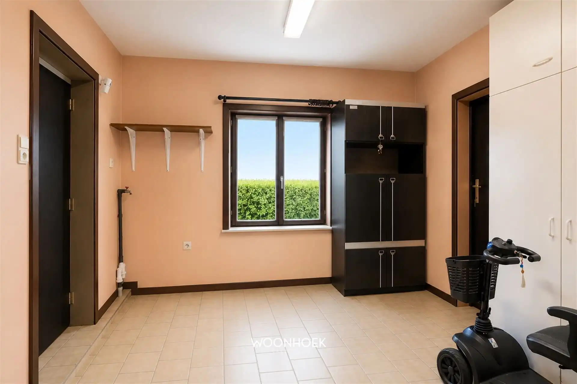 Ruime 3-slpk HOB met garage, veranda en zicht op de velden foto 12