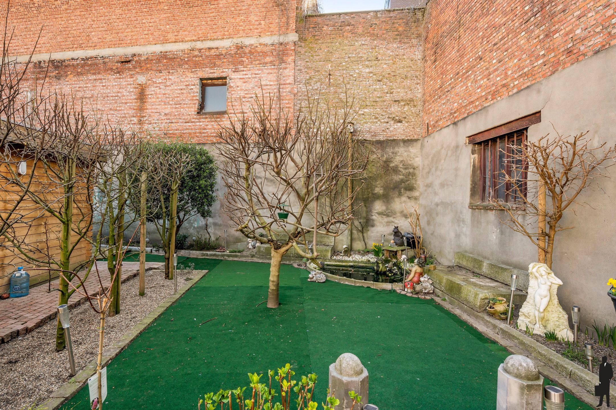 Exclusief gelijkvloers appartement met hoogwaardige afwerking en unieke stadstuin (230m²) foto 30