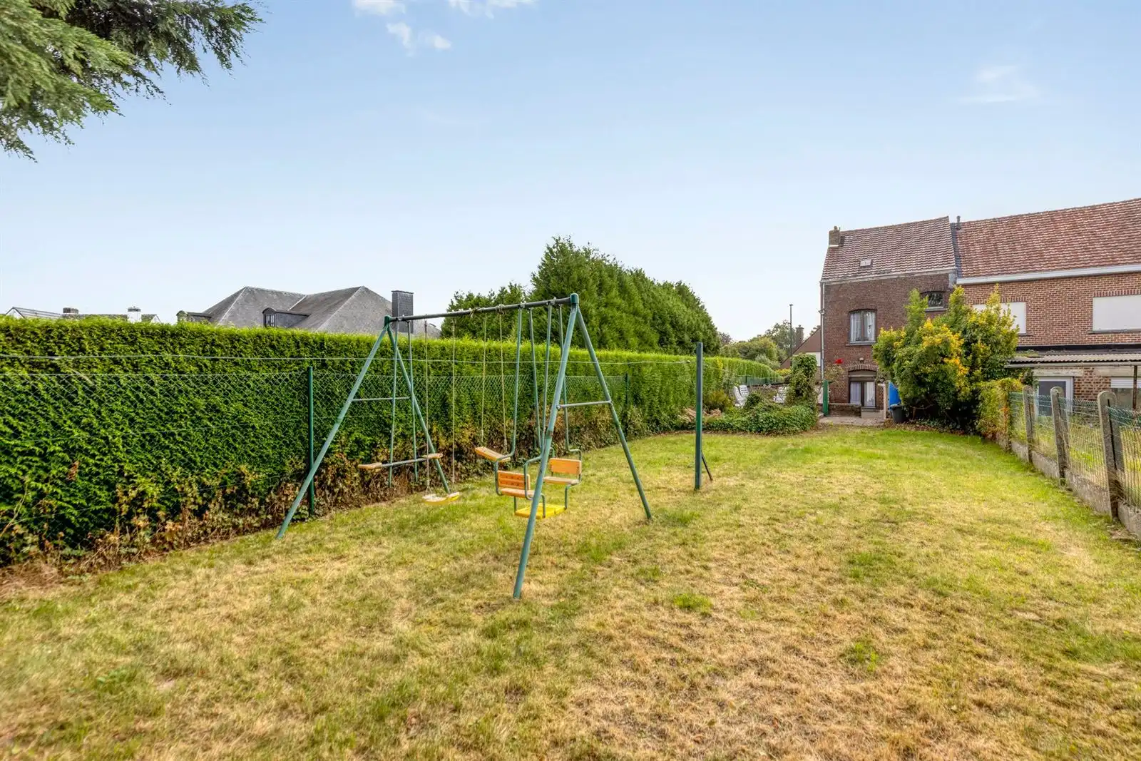 Te renoveren 3-gevelwoning met mogelijks 4 slaapkamers + garage foto 2