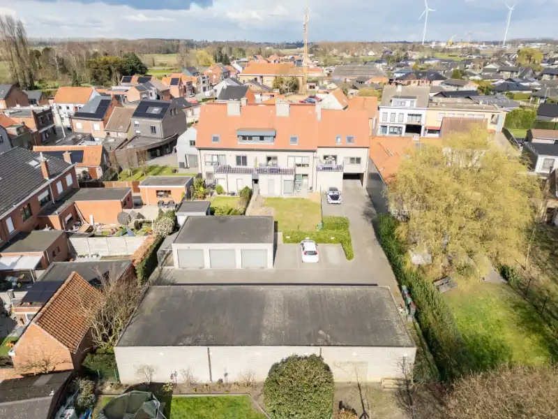 Opbrengsteigendom met 7 verhuurde appartementen, afzonderlijke garageboxen en staanplaatsen te Zelzate. foto 5