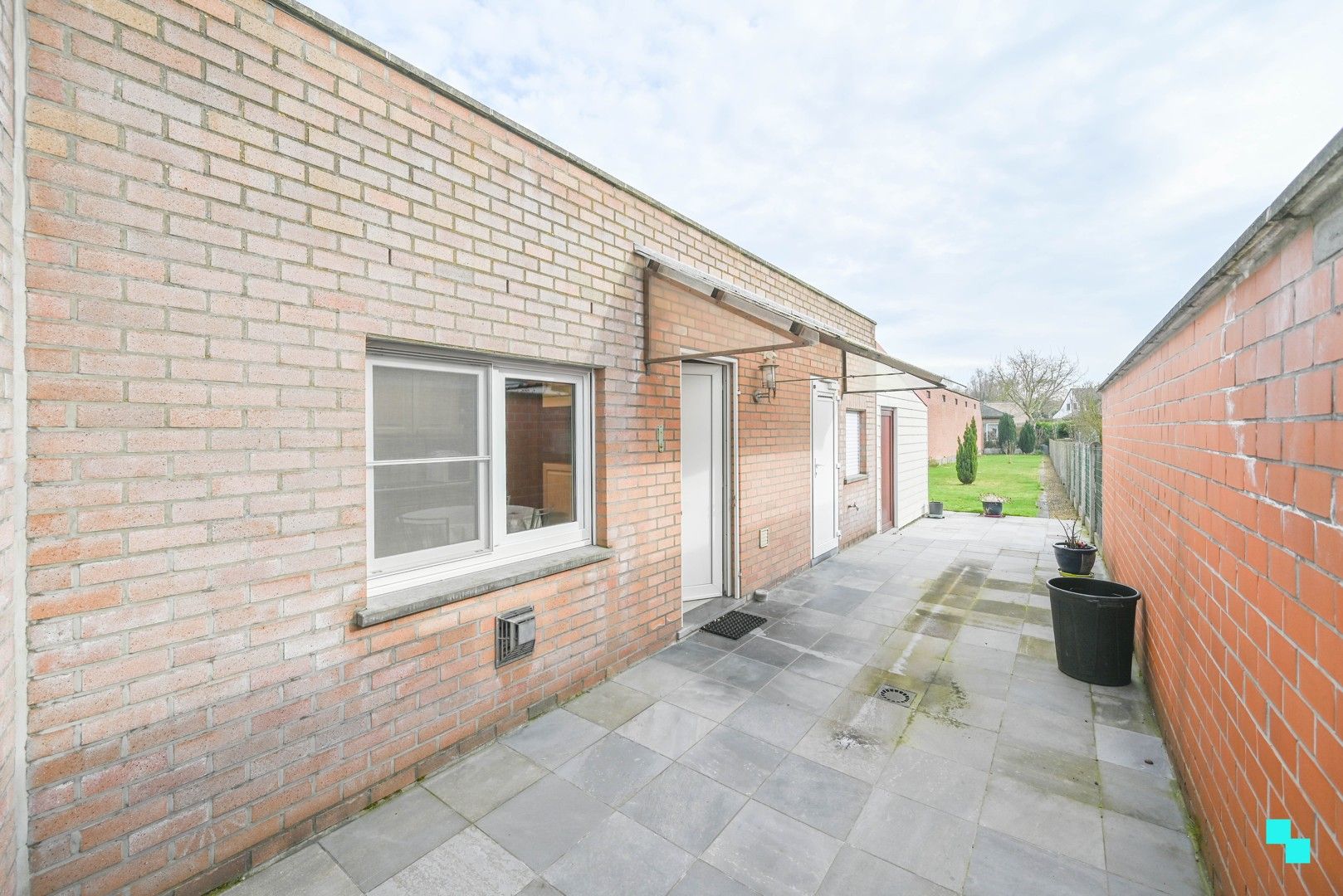 Stadswoning met uitgestrekte tuin te Kortrijk foto 12