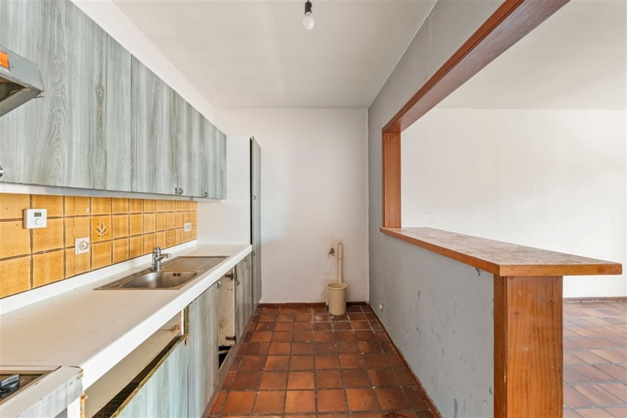 OPBRENGSTEIGENDOM MET 6 APPARTEMENTEN EN 4 STAANPLAATSEN IN SINT-TRUIDEN  foto 19