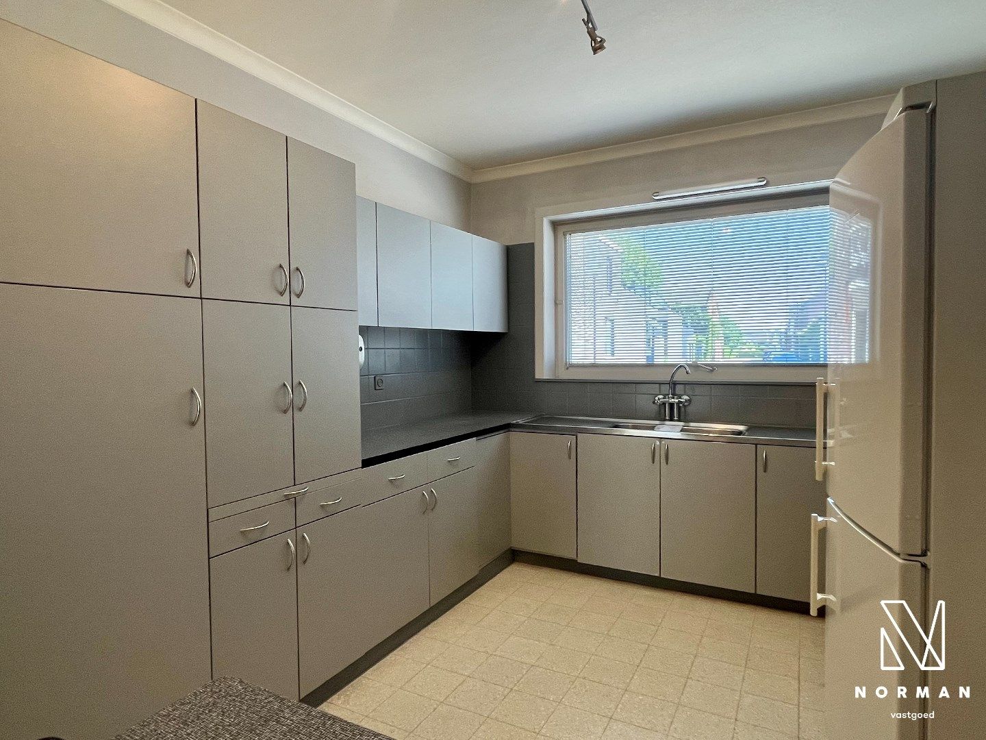 Ruime woning met 5 slks, garage in het centrum van Kuurne foto 9