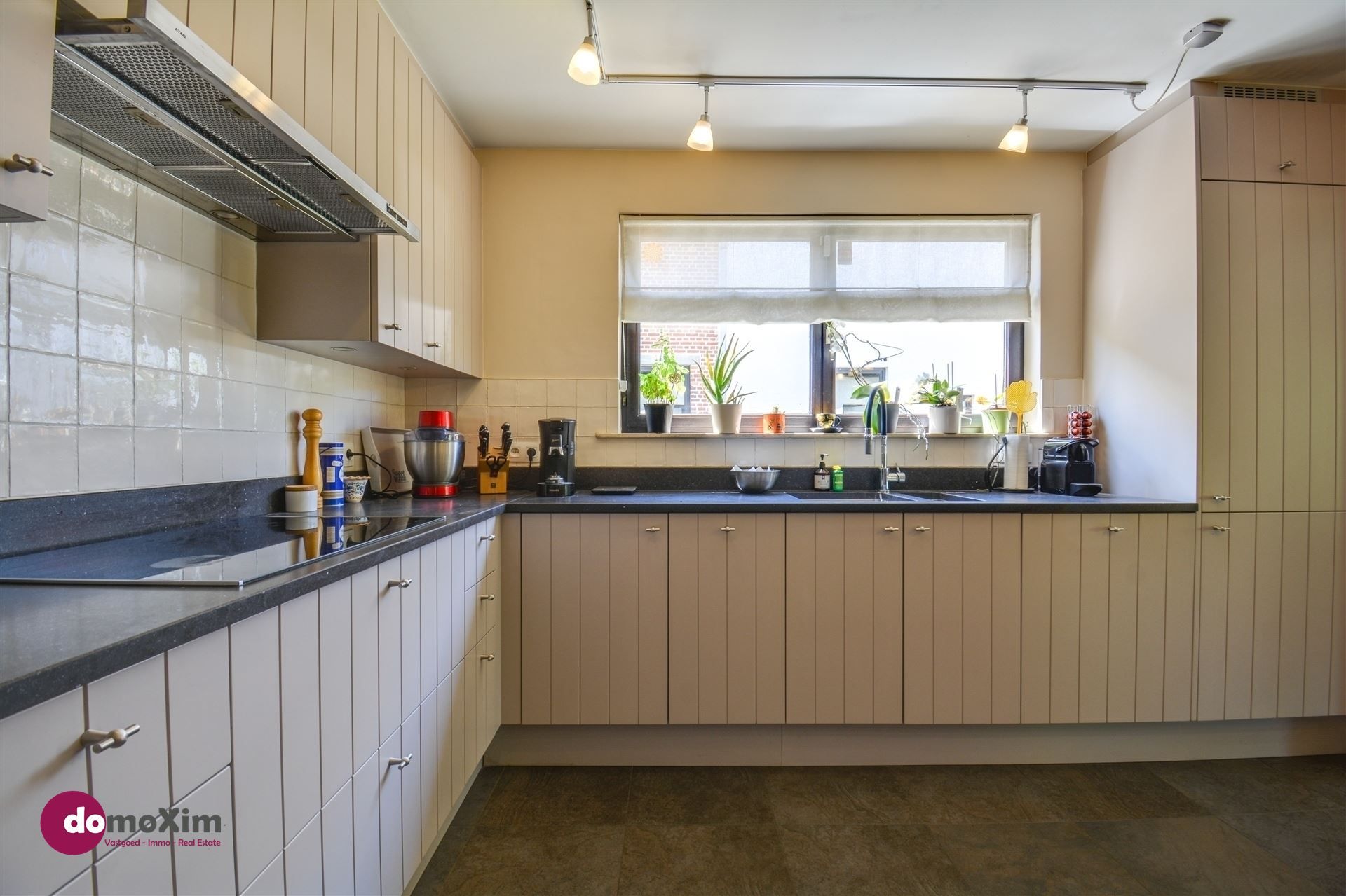 Instapklare woning met zonnige tuin vlak bij het centrum van Boortmeerbeek foto 11