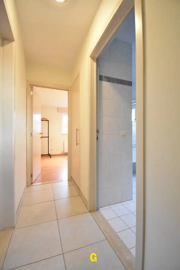 Ruim en degelijk appartement met twee slaapkamers, garage en kelderberging foto 22