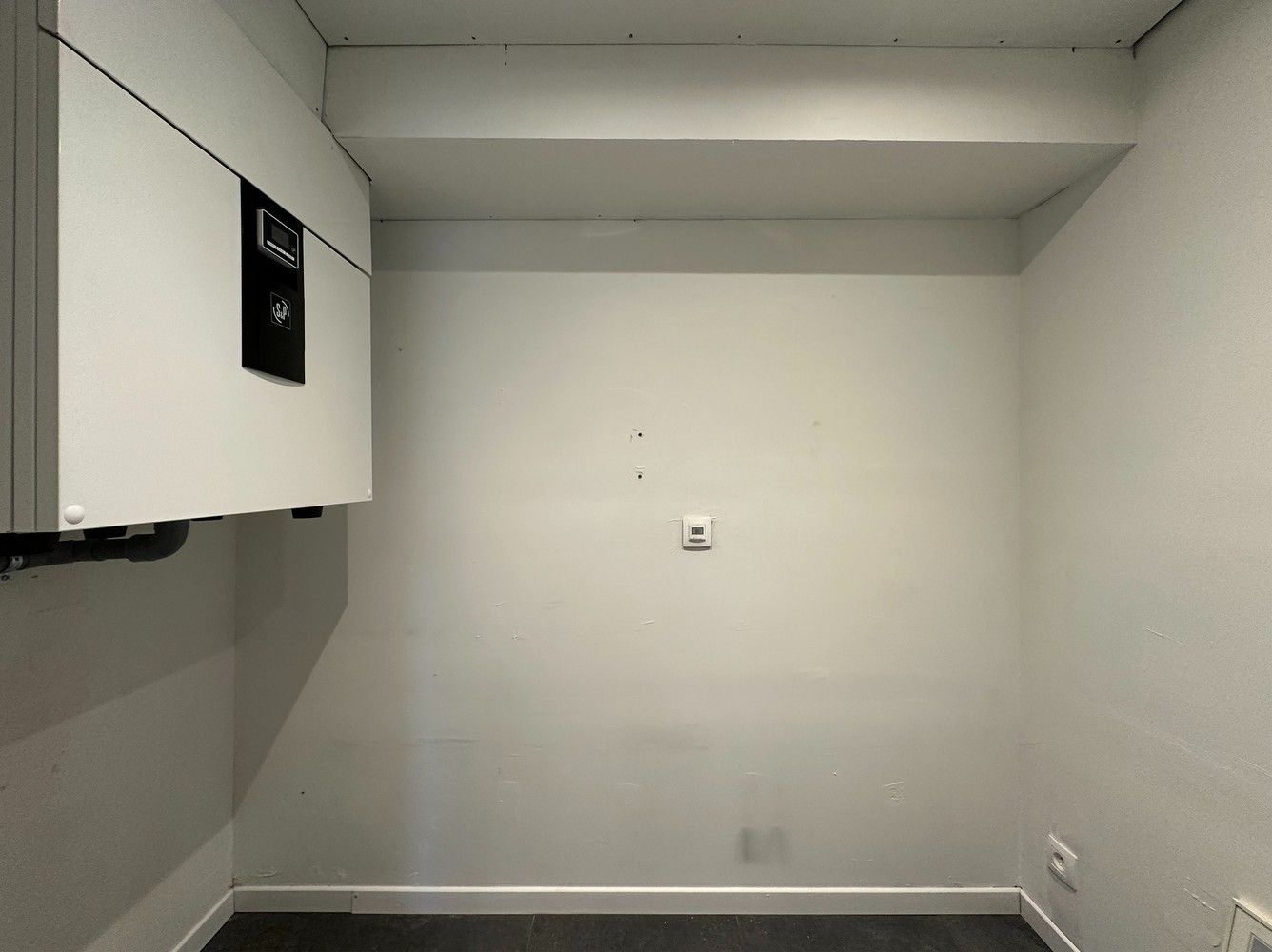 Ruim, gelijkvloers appartement met 2 slaapkamers, terras en een autostaanplaats! foto 11