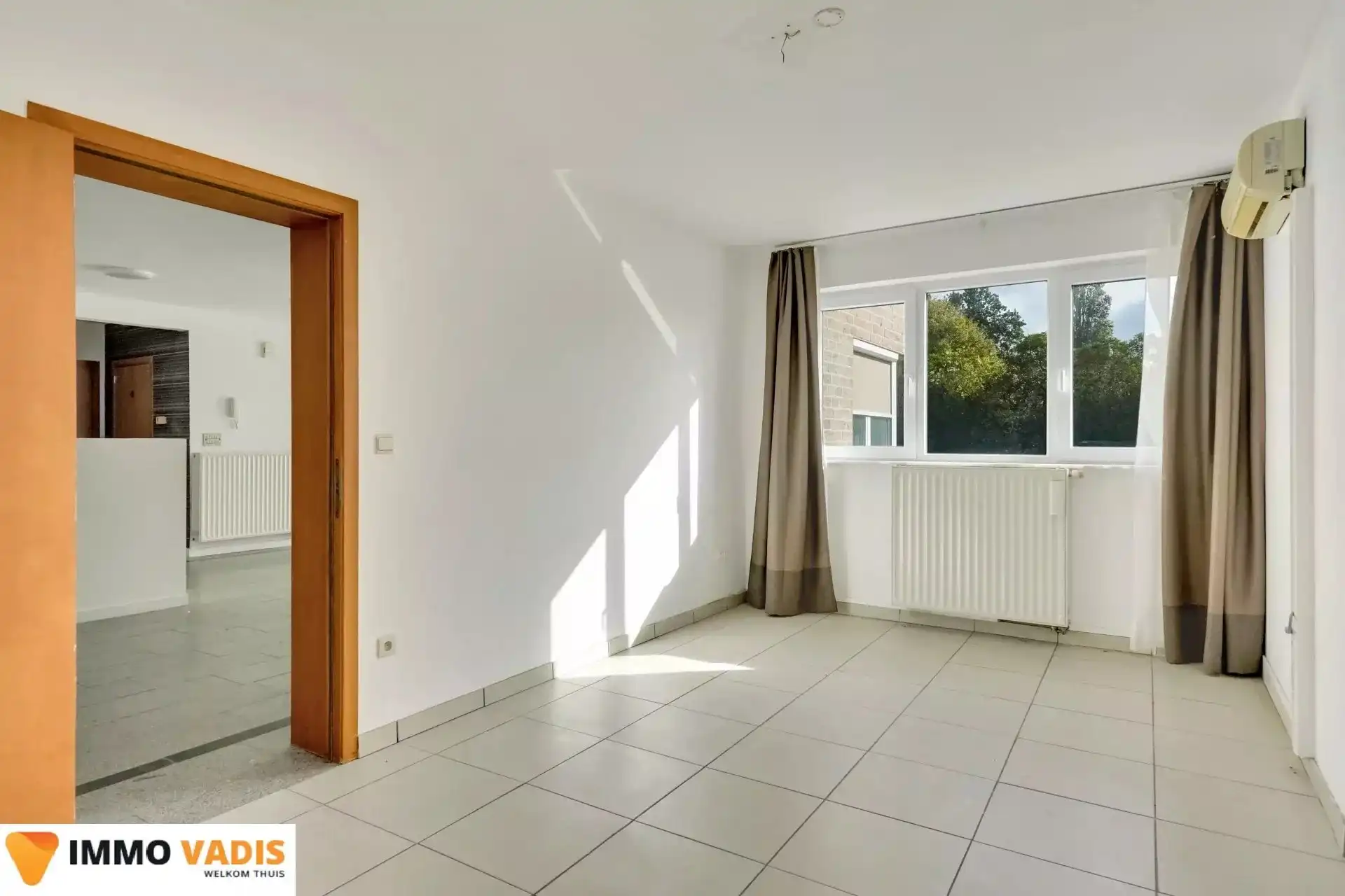 Ruim gelijkvloers appartement met  3 slaapkamers foto 4