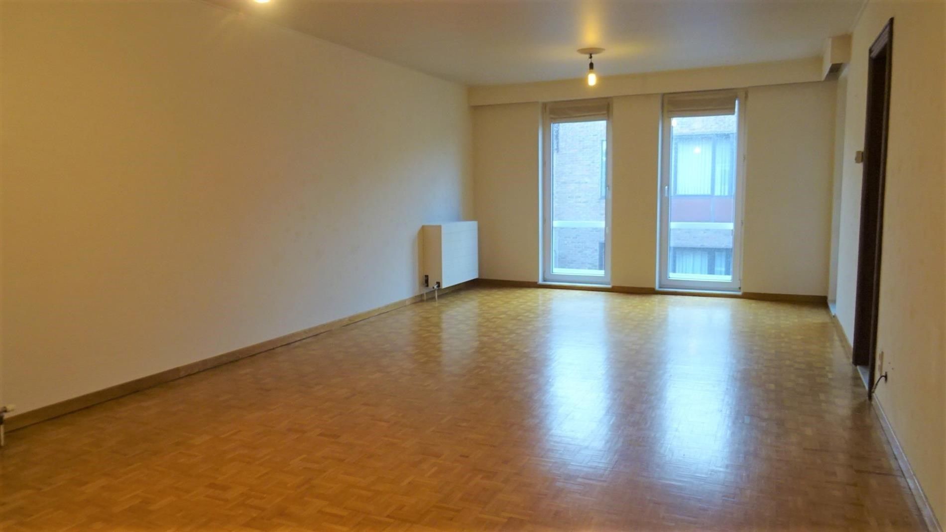 Ruim app. met 2 slpks, terras, optionele garage en kelder foto 3