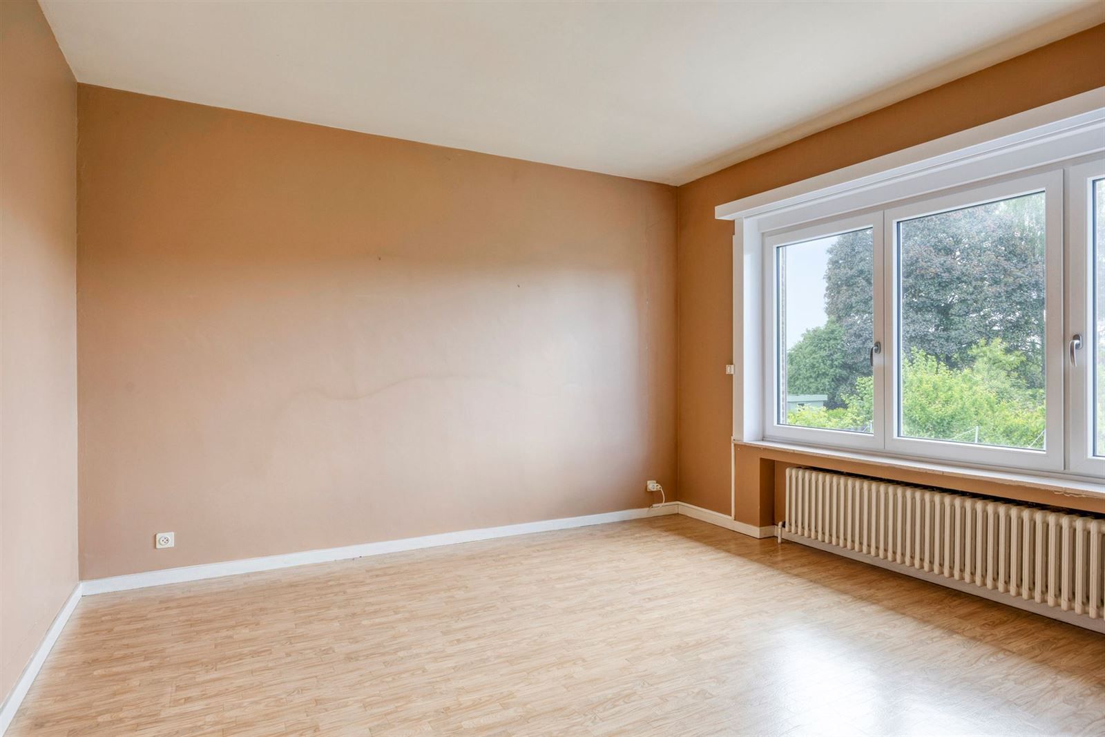 Ruime en zeer goed onderhouden 3-gevelwoning (EPC C) met garage foto 11