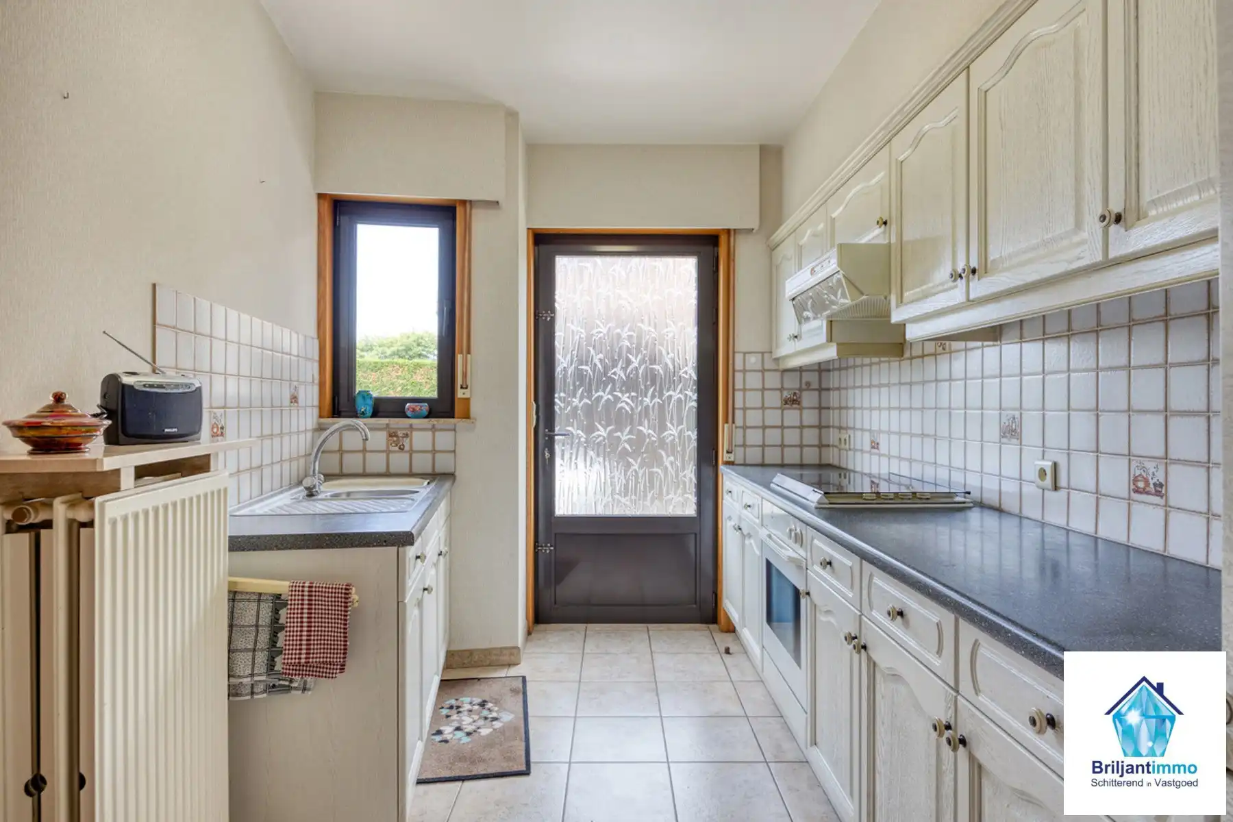 Gelijkvloers wonen met 3 slp, inpandige garage & toffe tuin foto 10