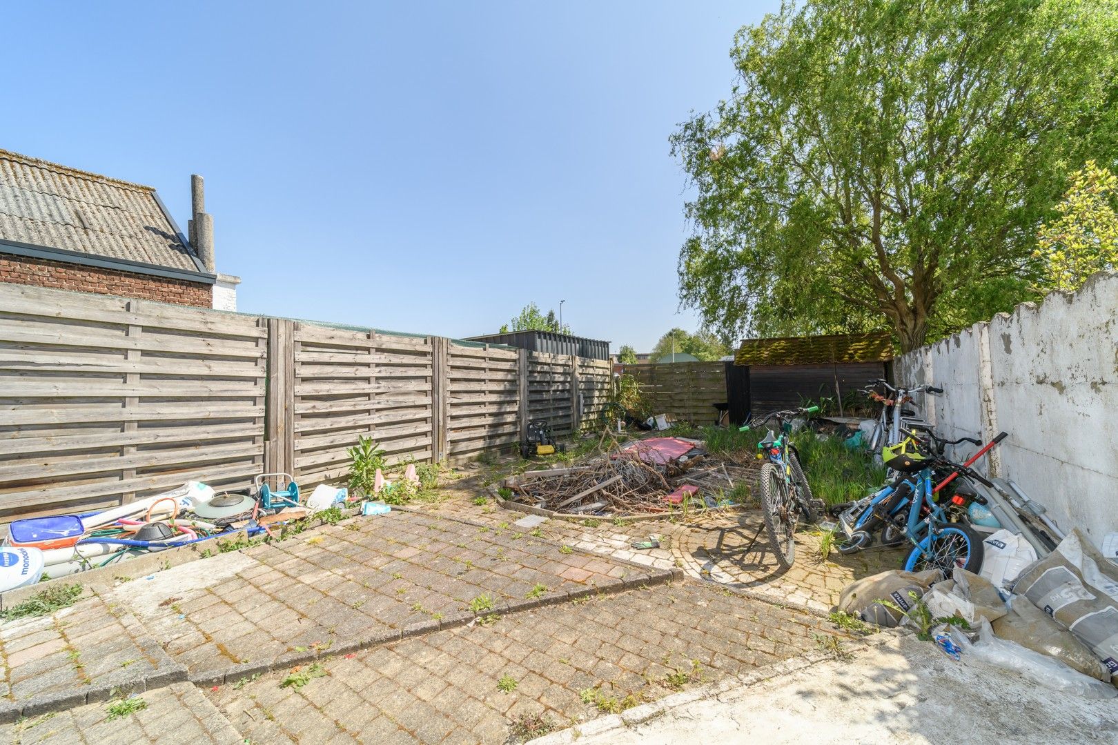 Verder af te werken gezinswoning met tuin foto 9
