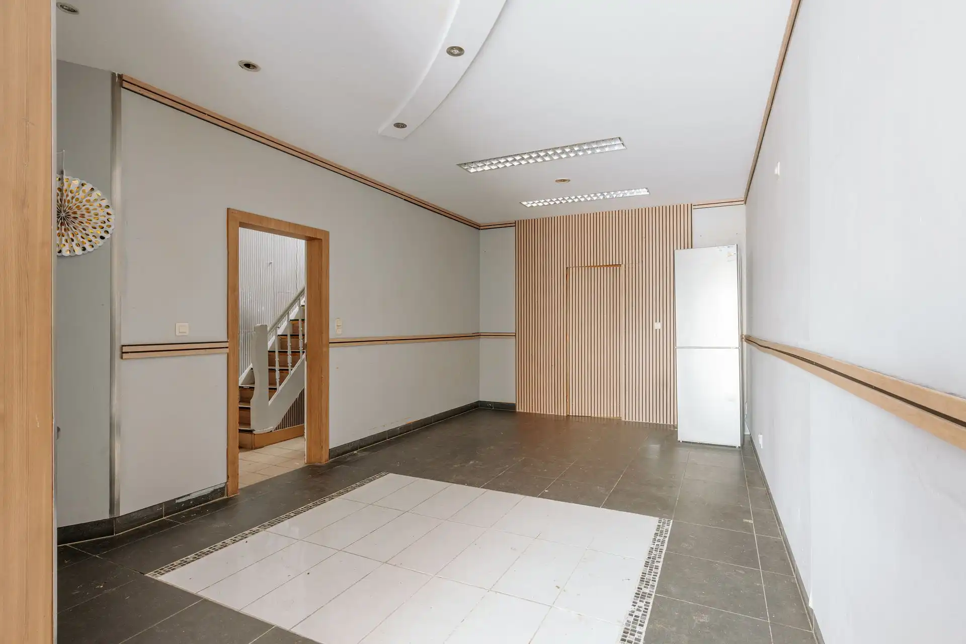 Ruim handelspand met magazijn in centrum Borsbeek. foto 9