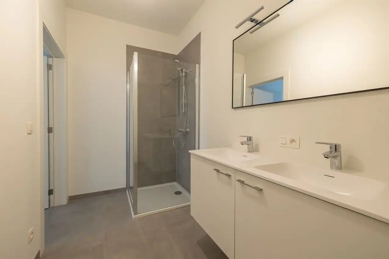 Nieuwbouwappartement met 1 slpk, autostaanplaats en terras foto 10