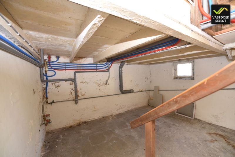 Vastgoed Select: Woning met mogelijkheden in het centrum van Sint-Laureins – 3 slaapkamers, garage en gelegen aan het Leopoldkanaal. foto 6