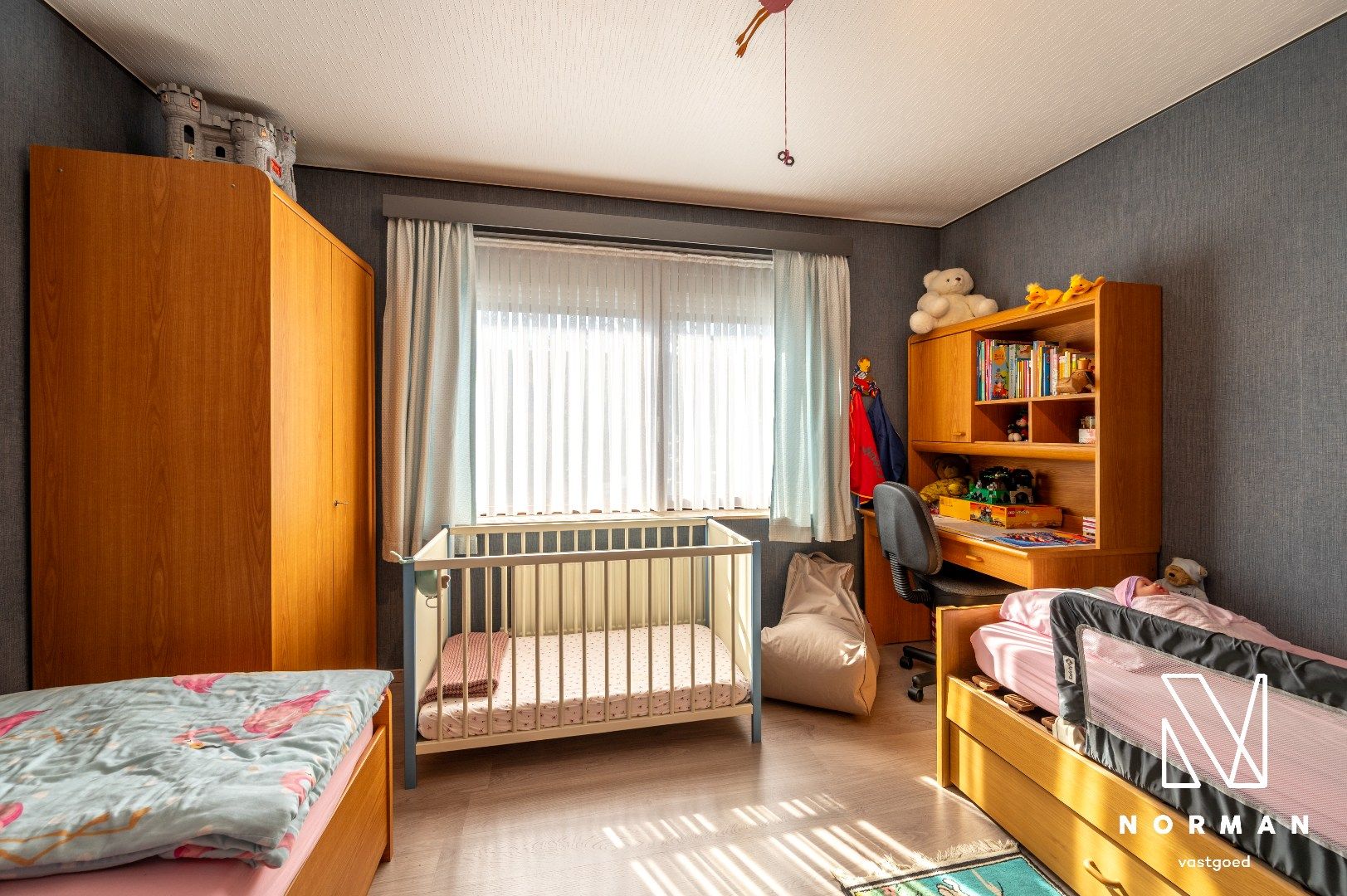 Halfopen woning met 4 slaapkamers en perfecte georiënteerde tuin in doodlopende straat in Kortrijk foto 13