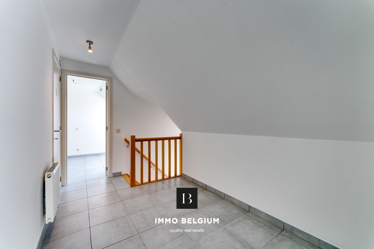 Ruim duplex appartement met 3 slaapkamers foto 10