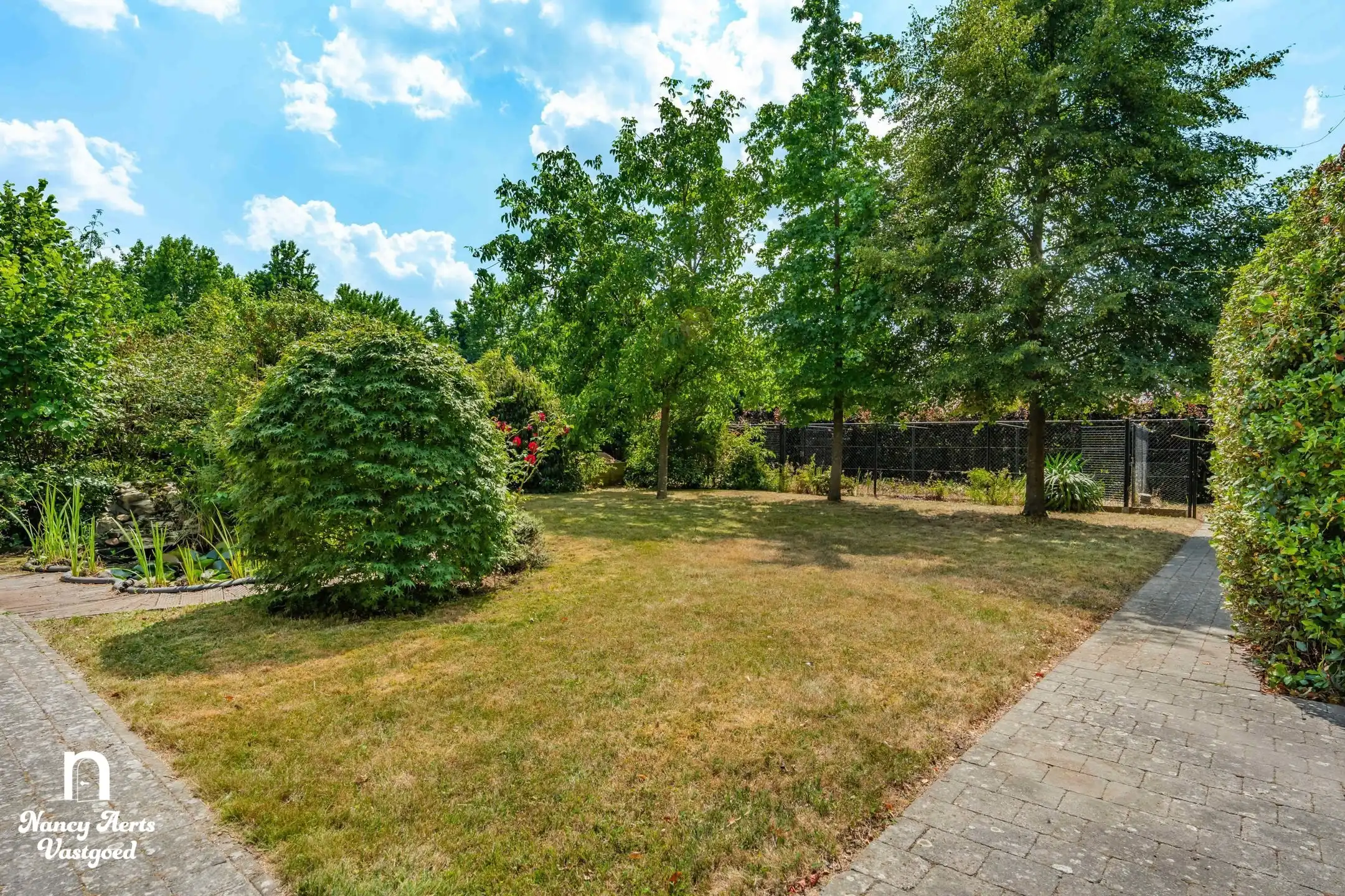 Ruime instapklare woning met prachtige tuin en 4 slaapkamers foto 25