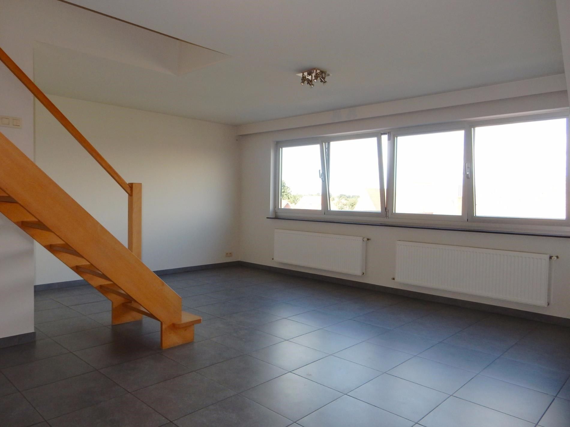 Ruim duplexappartement te Jabbeke foto 5