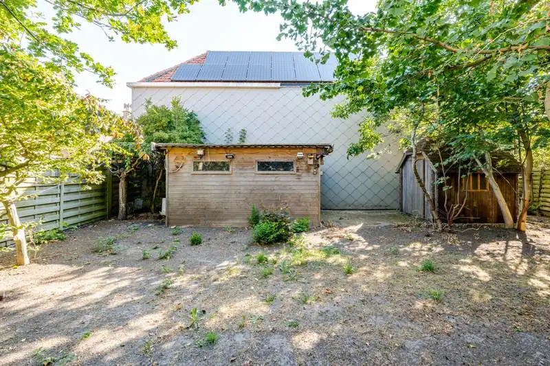 Op te frissen woning met perceel bouwgrond foto 16