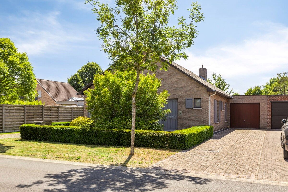 Rustig gelegen gelijkvloers woning met 2 slpks en ruime zolder. foto 22