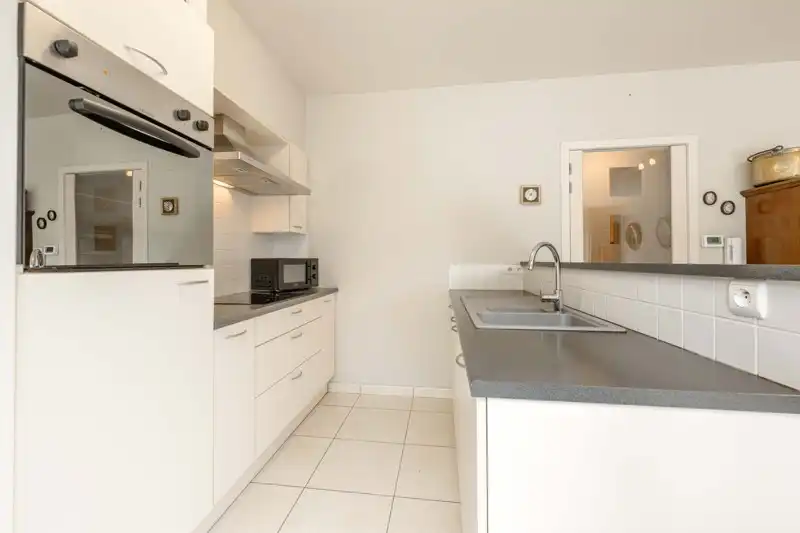 Gelijkvloers 2-slaapkamerappartement met tuin en garage nabij centrum Tielt TE KOOP! ✨🏡 foto 14