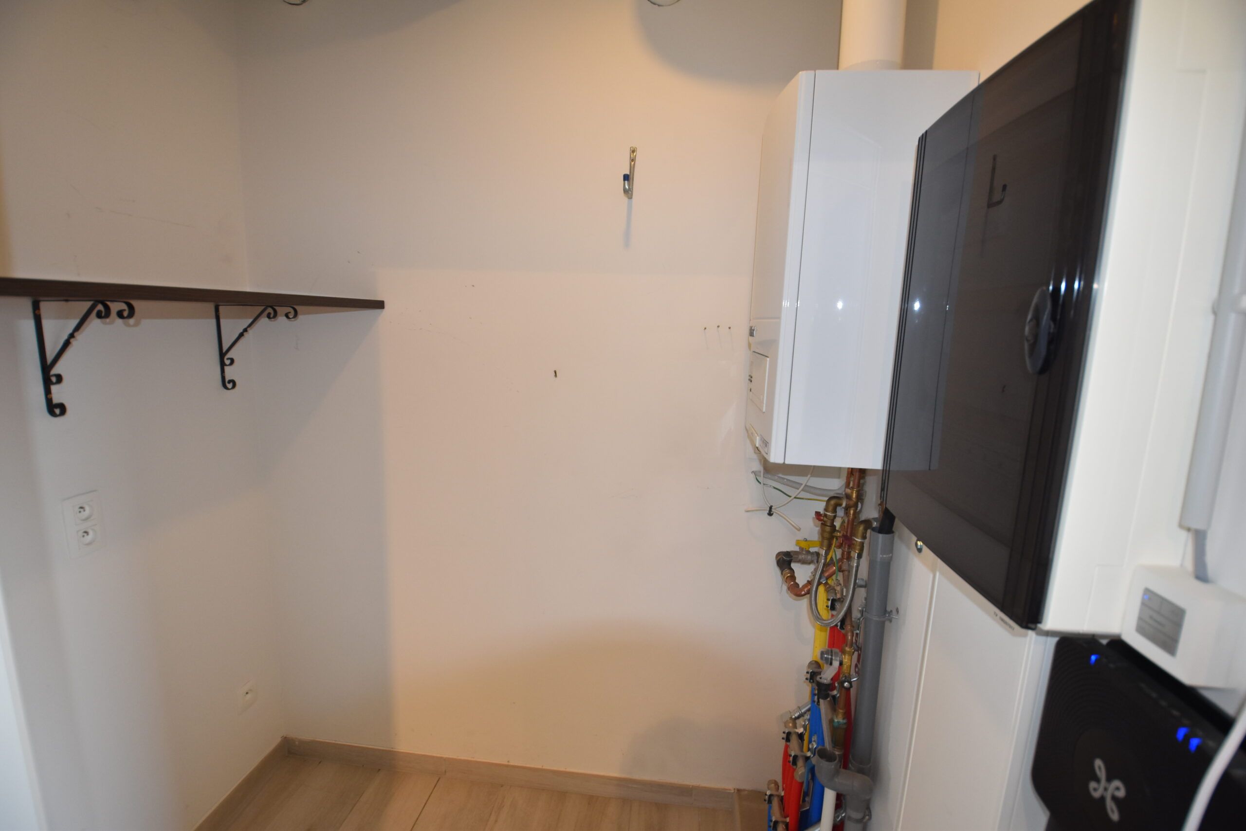 Assistentiewoning met 1 slaapkamer, berging en autostaanplaats in Sint-Niklaas foto 9
