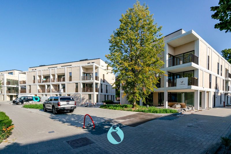 Green Square presenteert u 35 nieuwbouwappartementen en een winkelpand, letterlijk ónder de Kerktoren van Sleidinge. foto 2