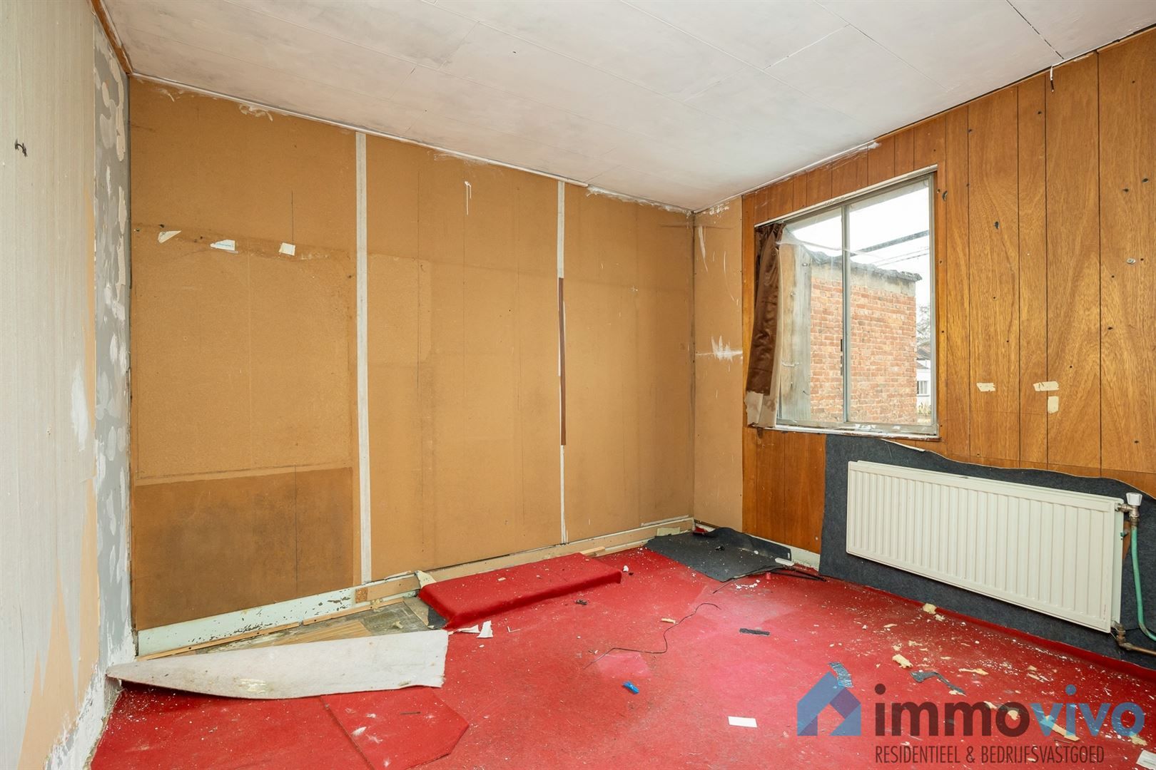 Ruime te renoveren gezinswoning met 4 slpk's en tuin foto 19