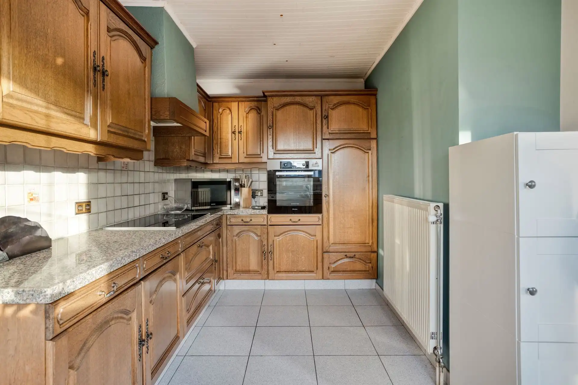 Op te frissen woning met 5 slpks nabij centrum Oostmalle! foto 12