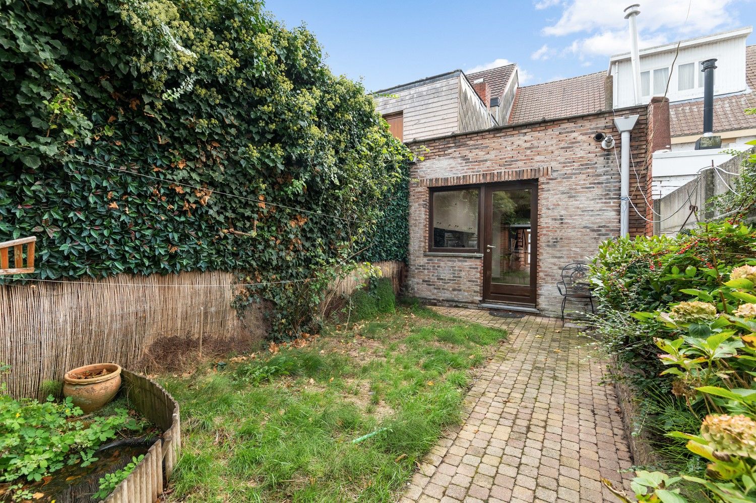 Huis met 3 slaapkamers en tuin te koop in Wijnegem! foto 12