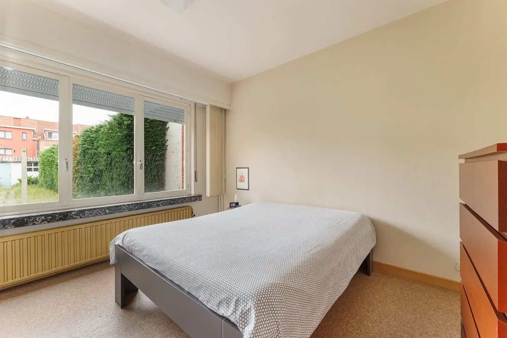 Ruime woning, perfect onderhouden met een zonnige tuin. foto 8