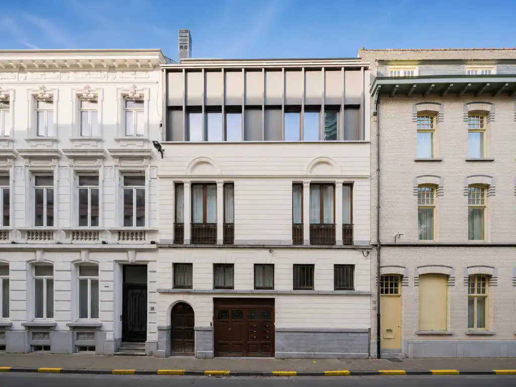 Architecturaal 2-slaapkamerappartement met zonnig terras in het historische stadscentrum van Gent. foto 4