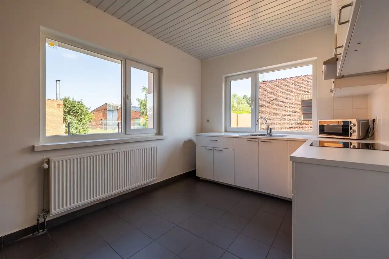 Verzorgde woning met 2 slpk., tuin en garage foto 7