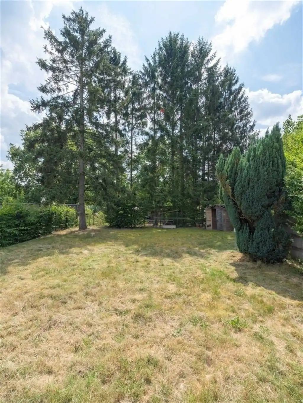 Halfopen bebouwing met kelderverdieping en ruime tuin foto 6