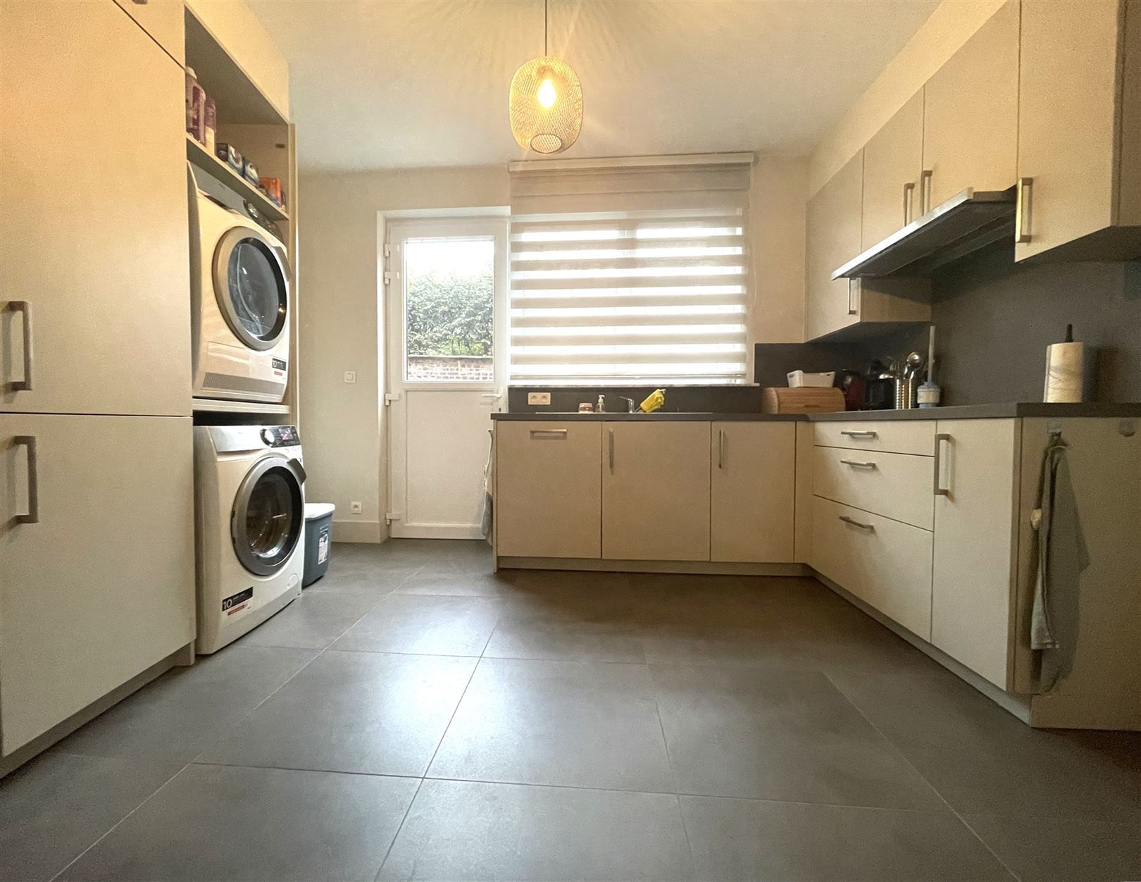 Totaal gerenoveerd GV appartement met tuin te Grembergen foto 6