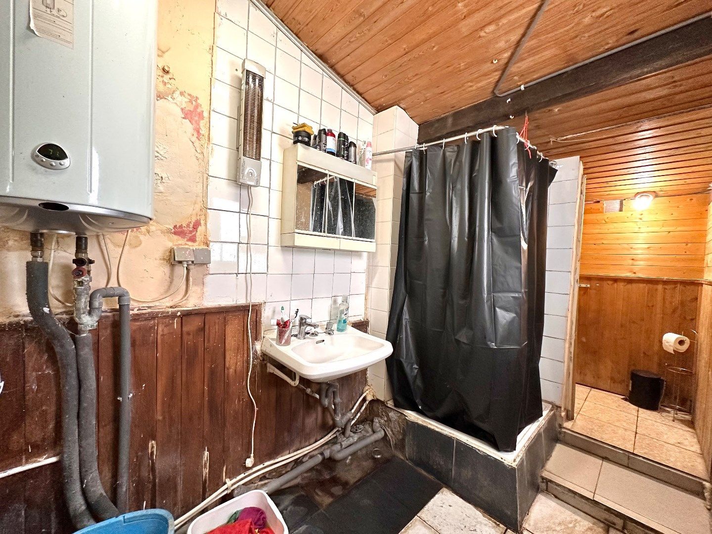 Te renoveren woning met tuin op toplocatie in Tongeren. foto 6