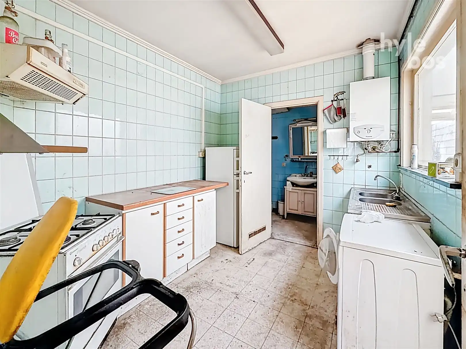 Te renoveren woning met tuin op uitstekende ligging foto 6