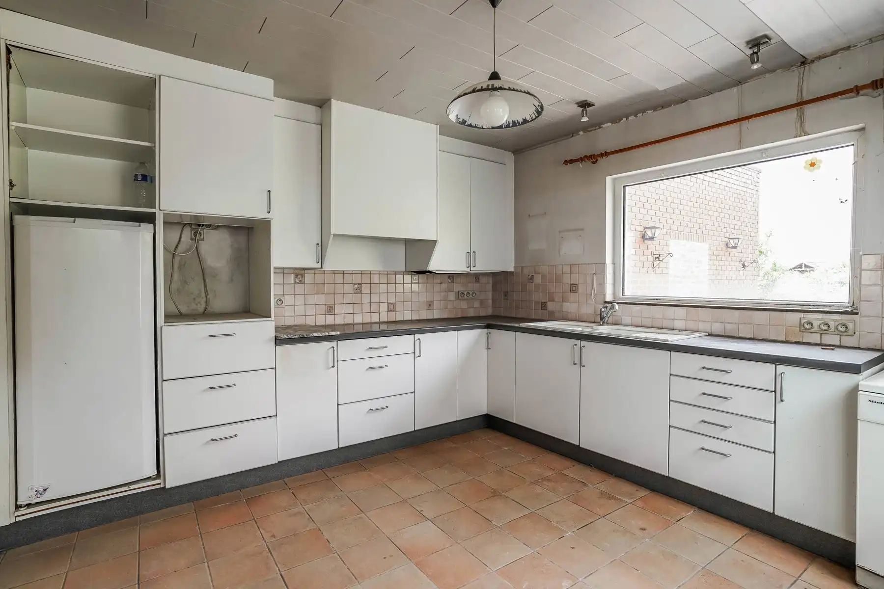 Te renoveren woning met tuin in centrum Londerzeel foto 6