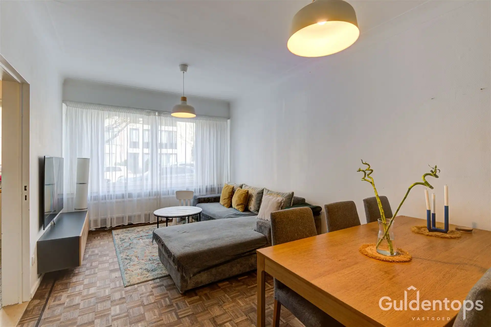 zeer goed gelegen ruim 2 slaapkamerappartement mét tuin foto 4