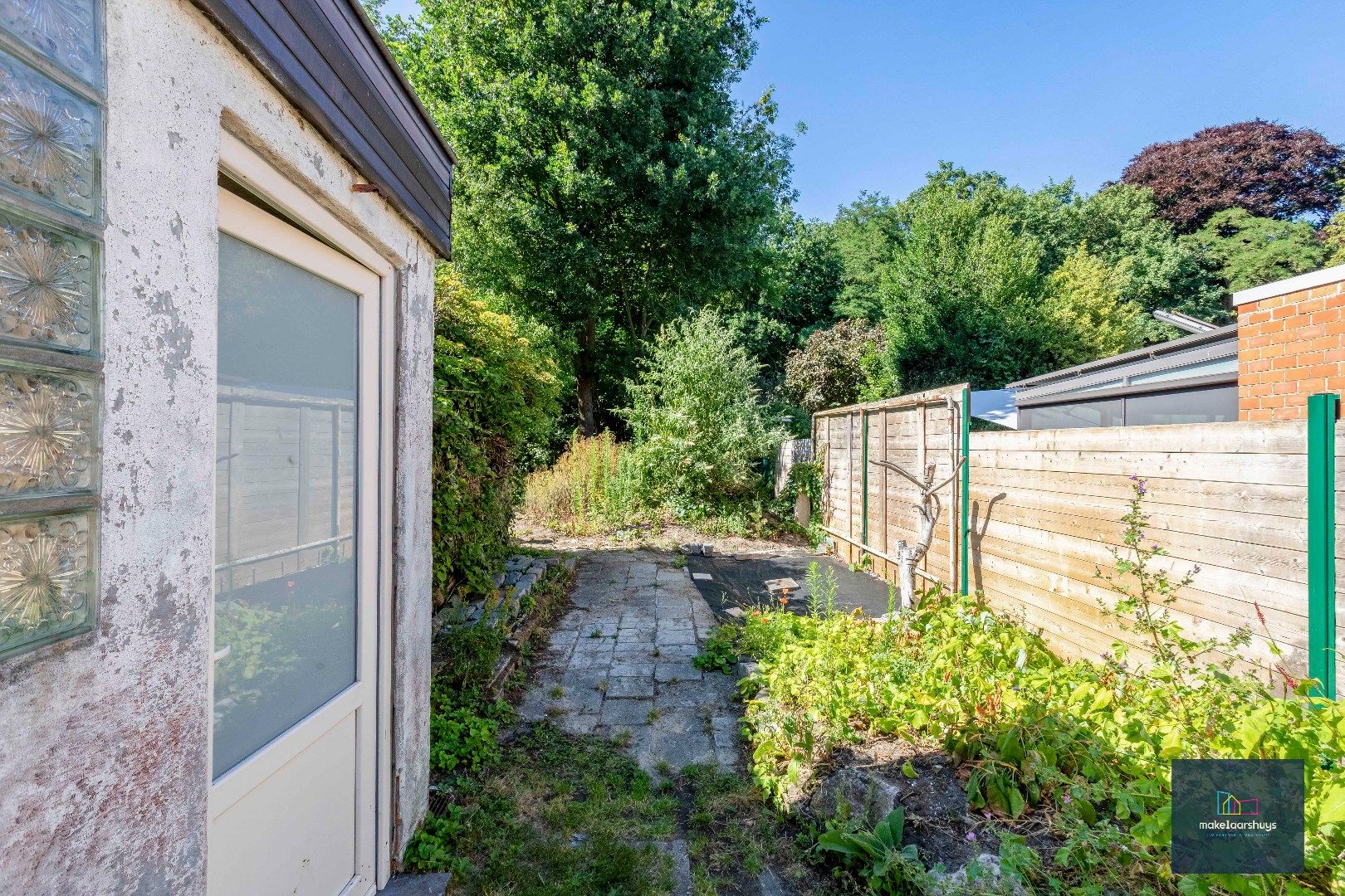 Residentieel gelegen  te renoveren halfopen bebouwing met tuin  foto 25