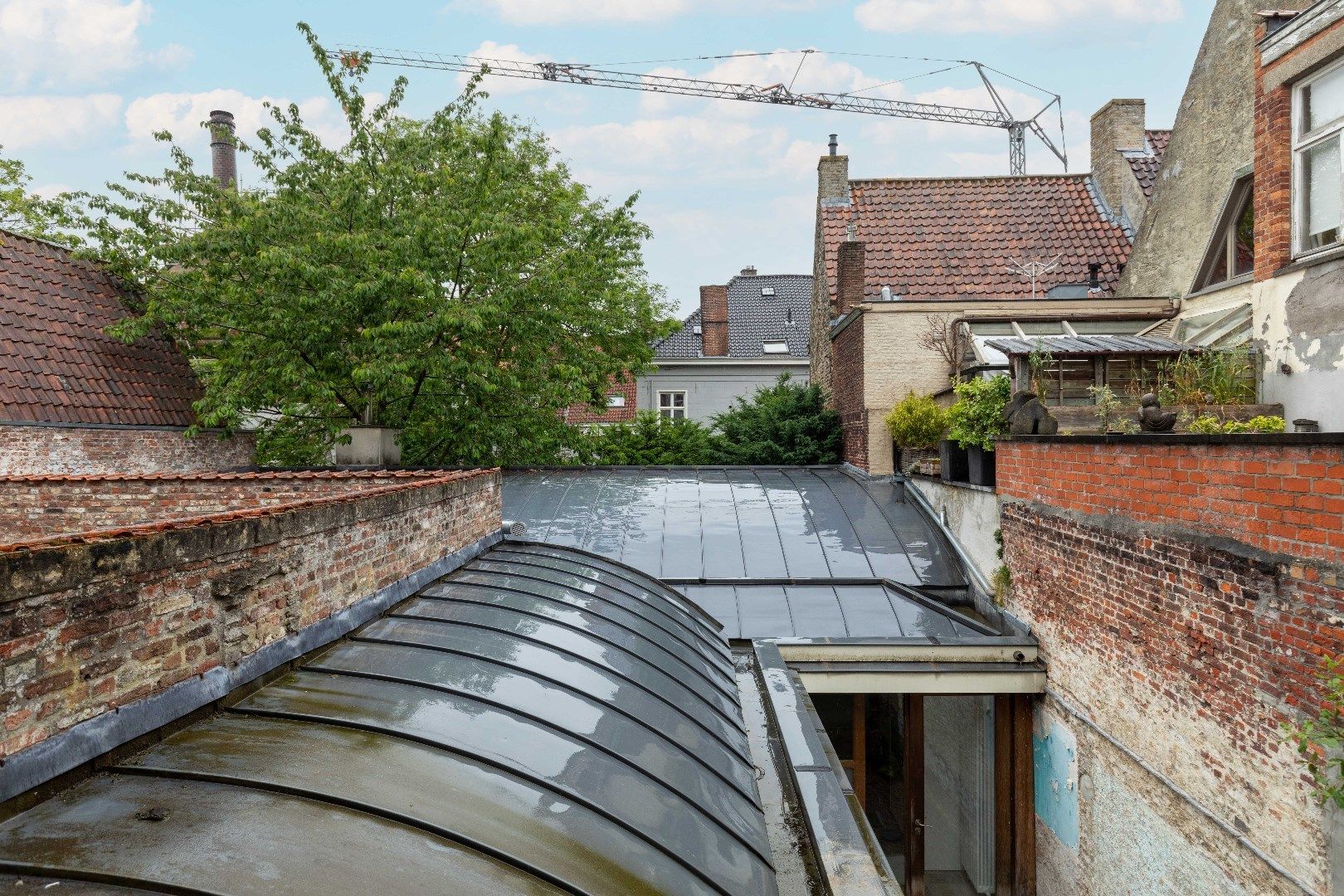 Grondig vernieuwde woning met horecazaak, vergunde B&B, ruime woonst en tuin met zicht op het water in hartje Brugge. foto 21