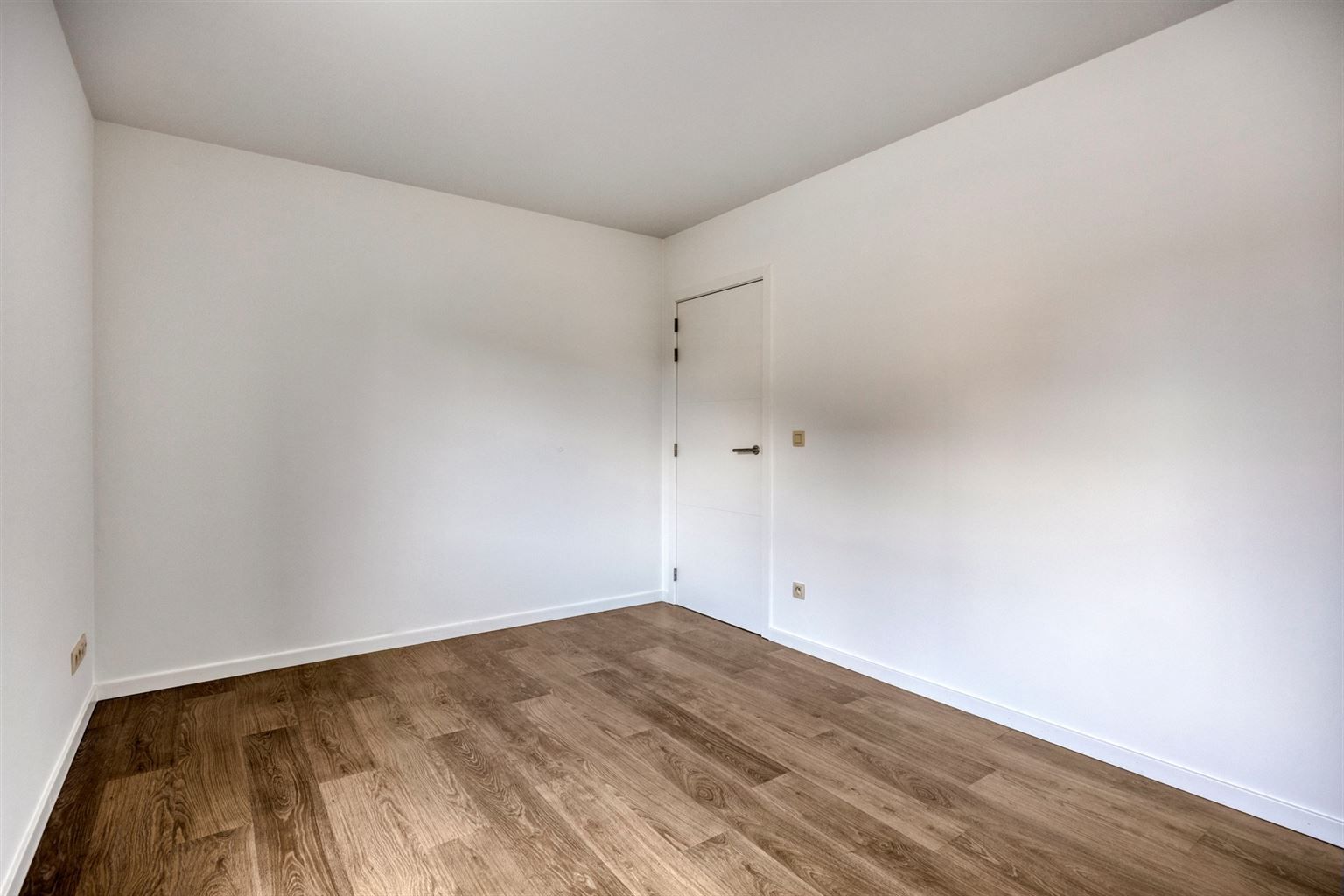 Instapklaar gelijkvloers appartement met 2 slaapkamers, ruime tuin en parkeergelegenheid op een rustige toplocatie in Opitter.  foto 16