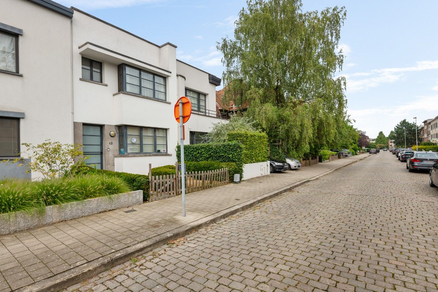 Top gelegen, instapklare woning met 2 à 3 slpk. en gezellig stadstuintje foto 21