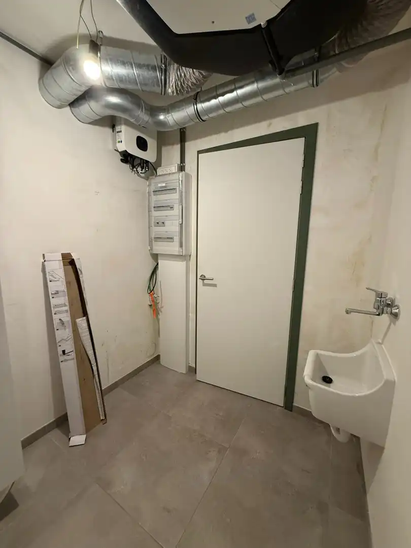 Instapklaar en energiezuinig gelijkvloers appartement met 1 slaapkamer en ruim terras te Riemst. foto 12